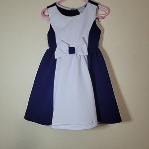 Elegant White and Navy Dress with Bow